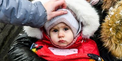 Åbn link til To år med krig i Ukraine: Giv varme til familier på flugt
